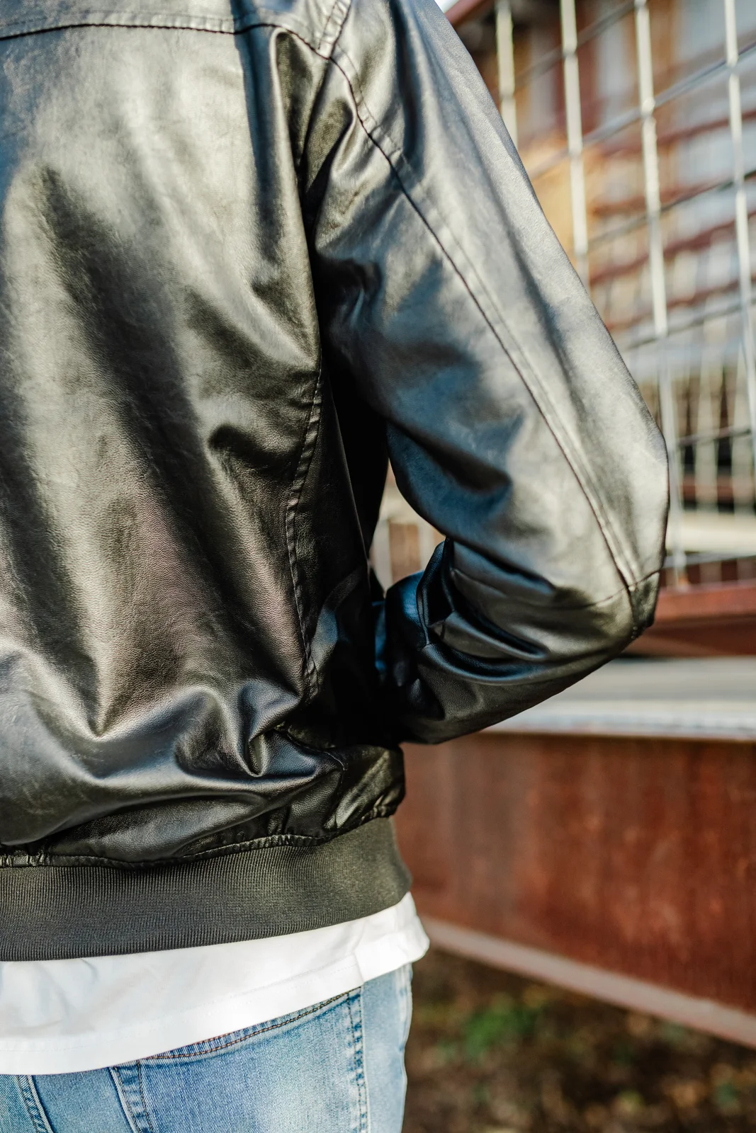 Back view showing the Classic Bomber's cut and drape